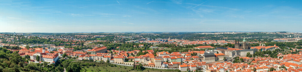 Naklejka na ściany i meble picturesque panorama of old European tourist city Prague, capital of Czech Republic. Skyline aerial view townscape on sunny day