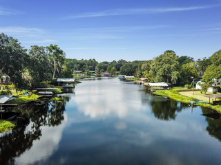 Fototapeta premium Aerial view of a river lined with boat docks