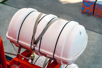Inflatable liferaft in hard-shelled canister. Lifeboat, rescue vessel.