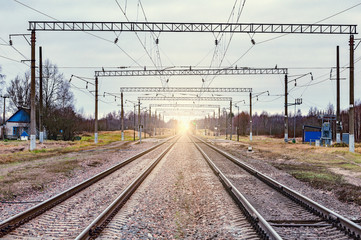 View of two railway trucks at autumn sunrise time.