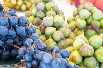 Fruit Stand with Figs and Purple Grapes