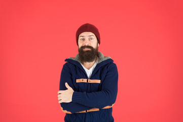 Hipster lifestyle. Stylish outfit hat accessory. Fashion trend. Casual clothes for winter season. Male fashion concept. Man bearded hipster stylish fashionable jumper and hat. Hipster with long beard