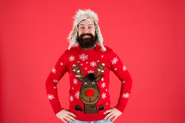 Get into festive spirit with cheerful reindeer sweater. Happy hipster in reindeer jumper. Spread cheer with reindeer design fashion. New year wardrobe collection with reindeer. Christmas eve party