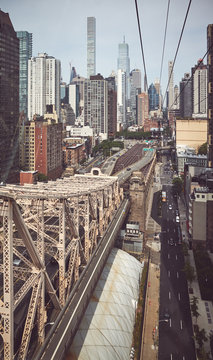 Retro toned picture of Queensboro Bridge and Manhattan skyline, New York City, USA..