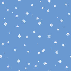 Fototapeta na wymiar The seamless winter pattern with white snowflakes on a blue background. Vector.