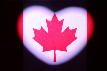 National flag of Canada in the shape of a heart. Symbol for the design and illustration of...