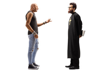 Male hipster talking to a priest