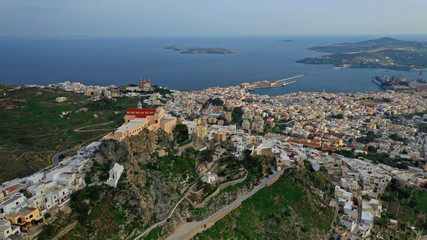 Aerial drone photo of iconic uphill catholic settlement of ano Syra featuring church of Saint George with beautiful colours, Syros or Siros island, Cyclades, Greece