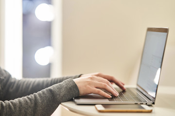 The girl works at the computer