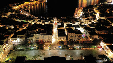 Aerial drone night shot of neoclassic landmark building of Ermoupolis town city hall in Miaouli square, Syros or Siros island, Cyclades, Greece