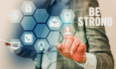 Writing note showing Be Strong. Business concept for able to withstand great circumstances or pressure in life