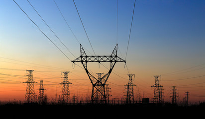 High voltage tower, silhouetted in the evening