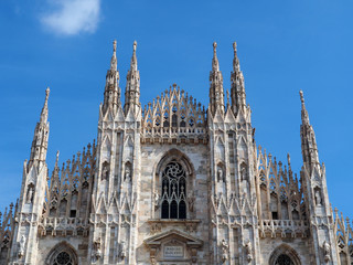 Fototapeta premium View of the exterior of the Milan Cathedral (Duomo di Milano) in Milan, Italy. It is dedicated to the Nativity of St Mary (Santa Maria Nascente).
