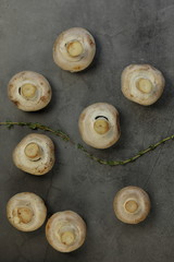 Button Mushrooms in a wooden bowl