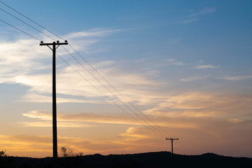 Fototapeta na wymiar power line in sunset 