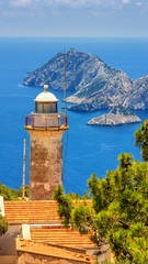 Fototapeta na wymiar Coastal summer landscape - view of the lighthouse on the Cape Gelidonya, Antalya Province in Turkey