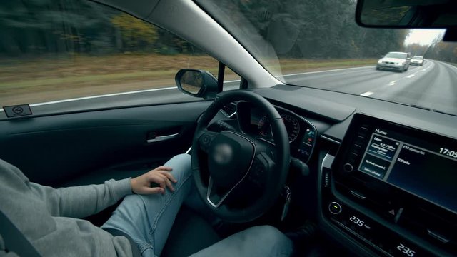 Modern car self-driving on autopilot.