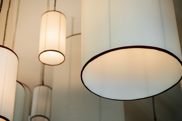 A large lamp hanging on the ceiling