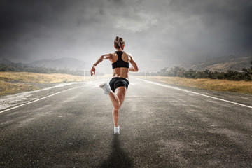 Fototapeta na wymiar Sportswoman run race. Mixed media