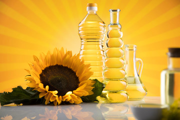 Bottles of sunflower oil with flower