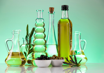 Cooking olive oils, bottles background