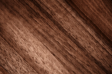 Fototapeta premium The texture of a wooden board closeup. Defocused background.