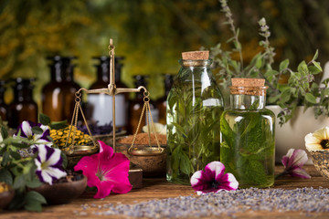 Herbs medicine and vintage wooden background