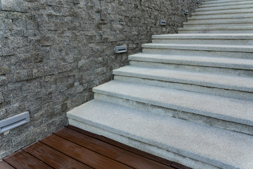 Stairs in the garden decorated with stone and wood
