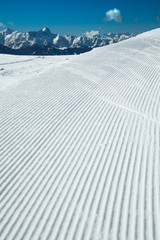 Fresh snow on ski slope, winter landscape