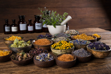 Natural remedy,Herbal medicine and wooden table background