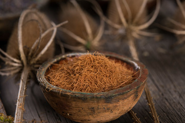 Herbs medicine and vintage wooden background