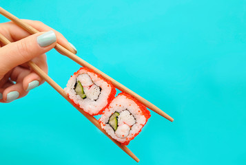 Japanese rolls on colorful background.