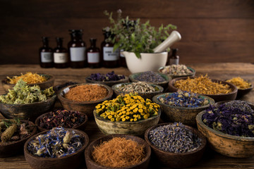 Natural remedy,Herbal medicine and wooden table background