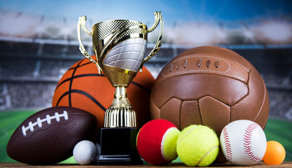 Award winning and championship concept, trophy cup on sport background