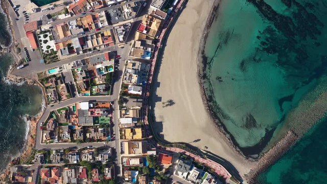 Vertical aerial top shot over Cape Palos Spain mar Menor la Manga residential houses and leisure harbour 