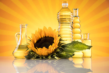 Bottles of sunflower oil with flower