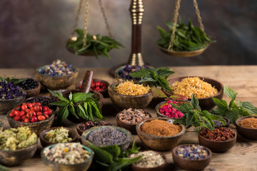 Herbs medicine and vintage wooden background
