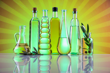 Olive oil bottles, olive branch and Cooking oils