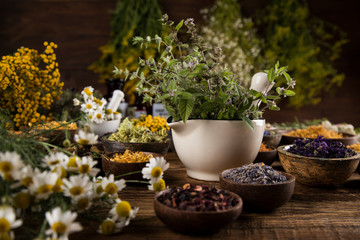 Natural remedy,Herbal medicine and wooden table background