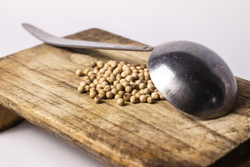 fresh raw  pepper to cook  on wooden , white background