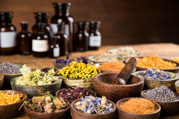 Natural remedy,Herbal medicine and wooden table background