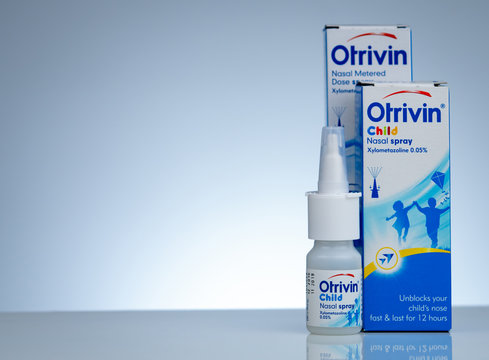 CHONBURI, THAILAND-NOVEMBER 11, 2018 : Otrivin nasal metered dose spray. Xylometazoline for unblocks nose fast and lasts for 12 hours. Nasal spray in drug bottle container on gradient background.