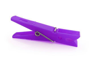Isolated green  plastic clothespin on white background.