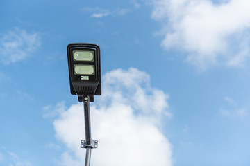 Solar cell smart street lamp with blue sky background in day time,Street light in park,Lamp park.