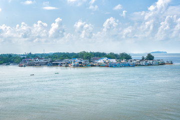 Fototapeta na wymiar Landscape view of River and Boat of fisherman in harbor at Chantaburi, Thailand.