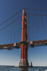 Fototapeta premium Golden Gate Bridge tower from a boat , San Francisco