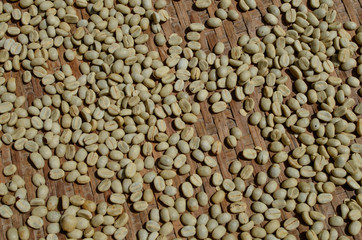 dry coffee bean on bamboo weave