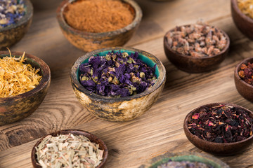 Herbs medicine and vintage wooden background