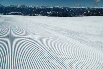 Fototapeta na wymiar View of mountains and ski slopes