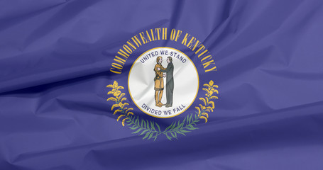 Crease of Kentucky fabric flag background. The Commonwealth's seal on a navy blue field and the words "Commonwealth of Kentucky" above and sprigs of goldenrod, the state flower, below.